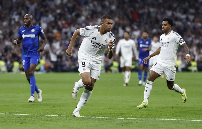 Reali i afrohet në një pikë Barcelonës